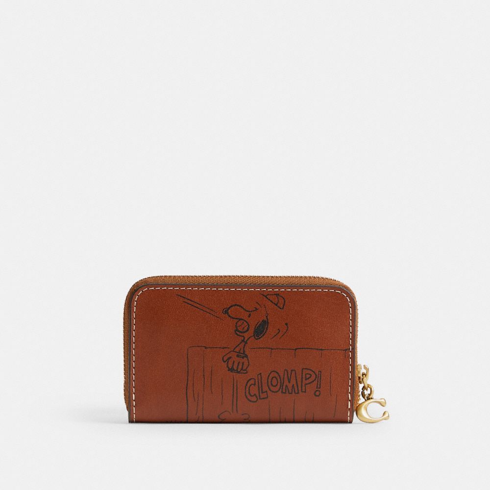 COACH®,【COACH X PEANUTS】スモール ジップ アラウンド カード ケース・ニュースペーパー プリント,カードケース/定期入れ/名刺入れ,ﾌﾞﾗｽ/ﾍｰｾﾞﾙﾅｯﾂ