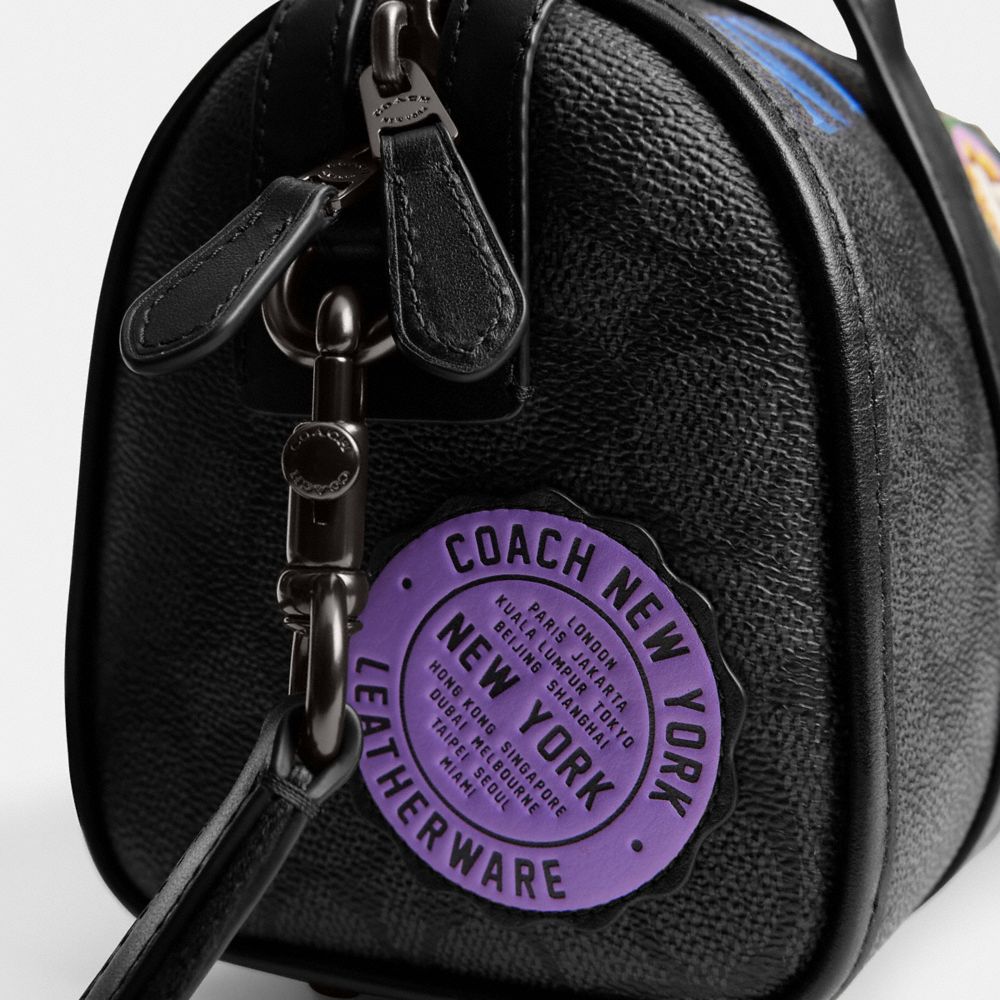 COACH®,Gotham Duffle Bag 24 In Signature Canvas With Patches,,Closer View