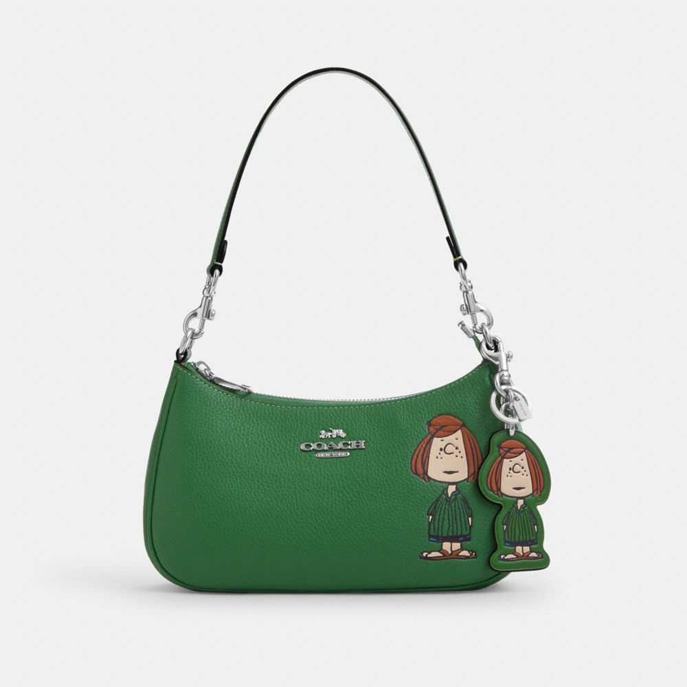 COACH®,Coach X Peanuts Peppermint Patty Bag Charm,,Angle View