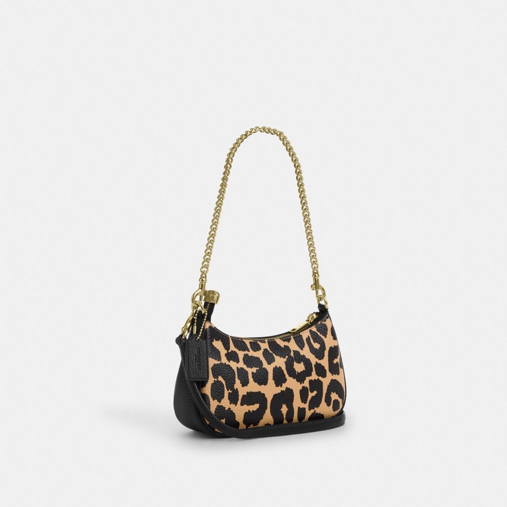 COACH®,Teri Mini Crossbody Bag With Leopard Print,Leather,Shoulder Bag,Faux Leather,Logo,Metal,Compact,Lined,Adjustable,Go...,Multi Color,Angle View