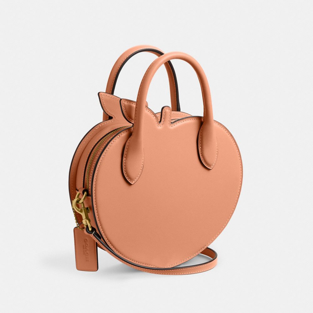 COACH®,Peach Bag In Regenerative Leather,,Angle View