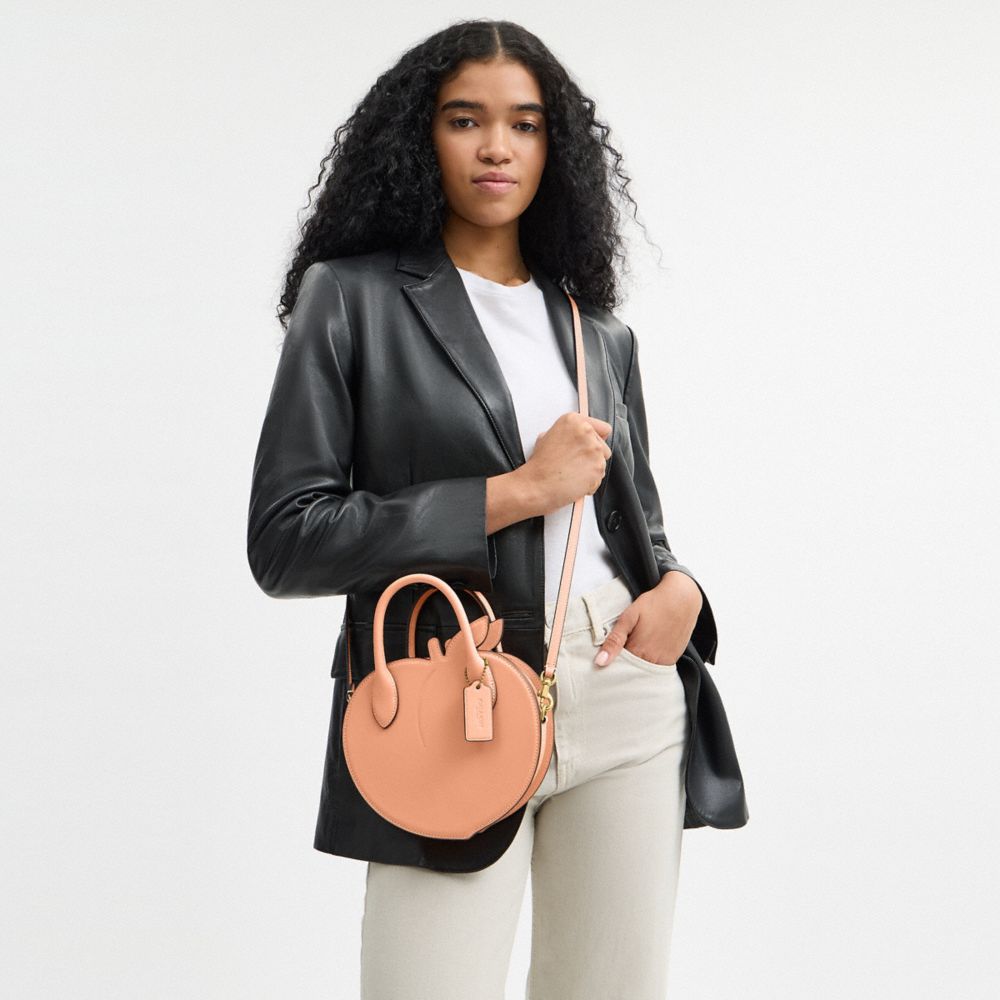 COACH®,Peach Bag In Regenerative Leather,