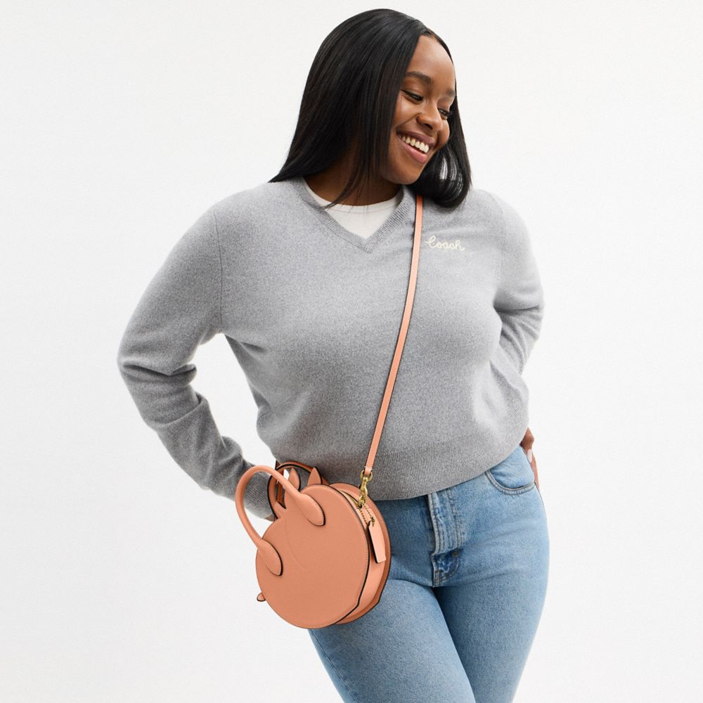 COACH®,Peach Bag In Regenerative Leather,