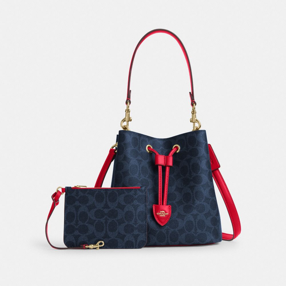 COACH®,Rowan Bucket Bag In Signature Canvas,Leather,Canvas,Bucket,Metal,Casual,,Angle View