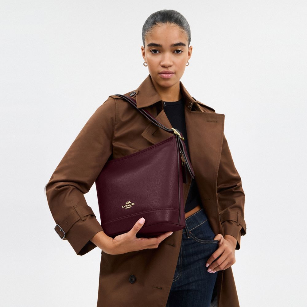 COACH®,Jude Duffle Bag,Leather,Crossbody,Logo,Metal,Gold Metal,Casual,Maroon,Detail View