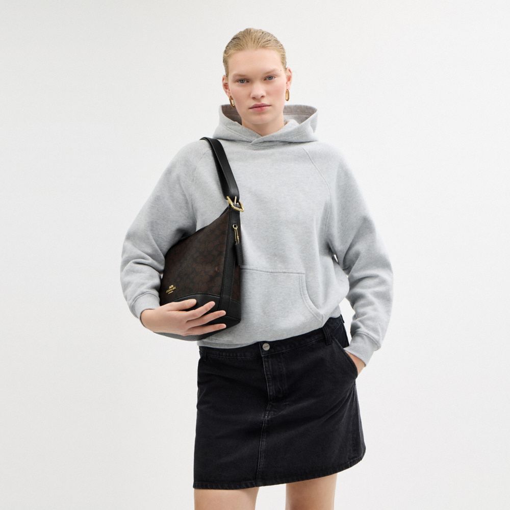 COACH®,Jude Duffle Bag In Signature Canvas,Canvas,Leather,Crossbody,Metal,Color Block,Casual,Brown,Detail View