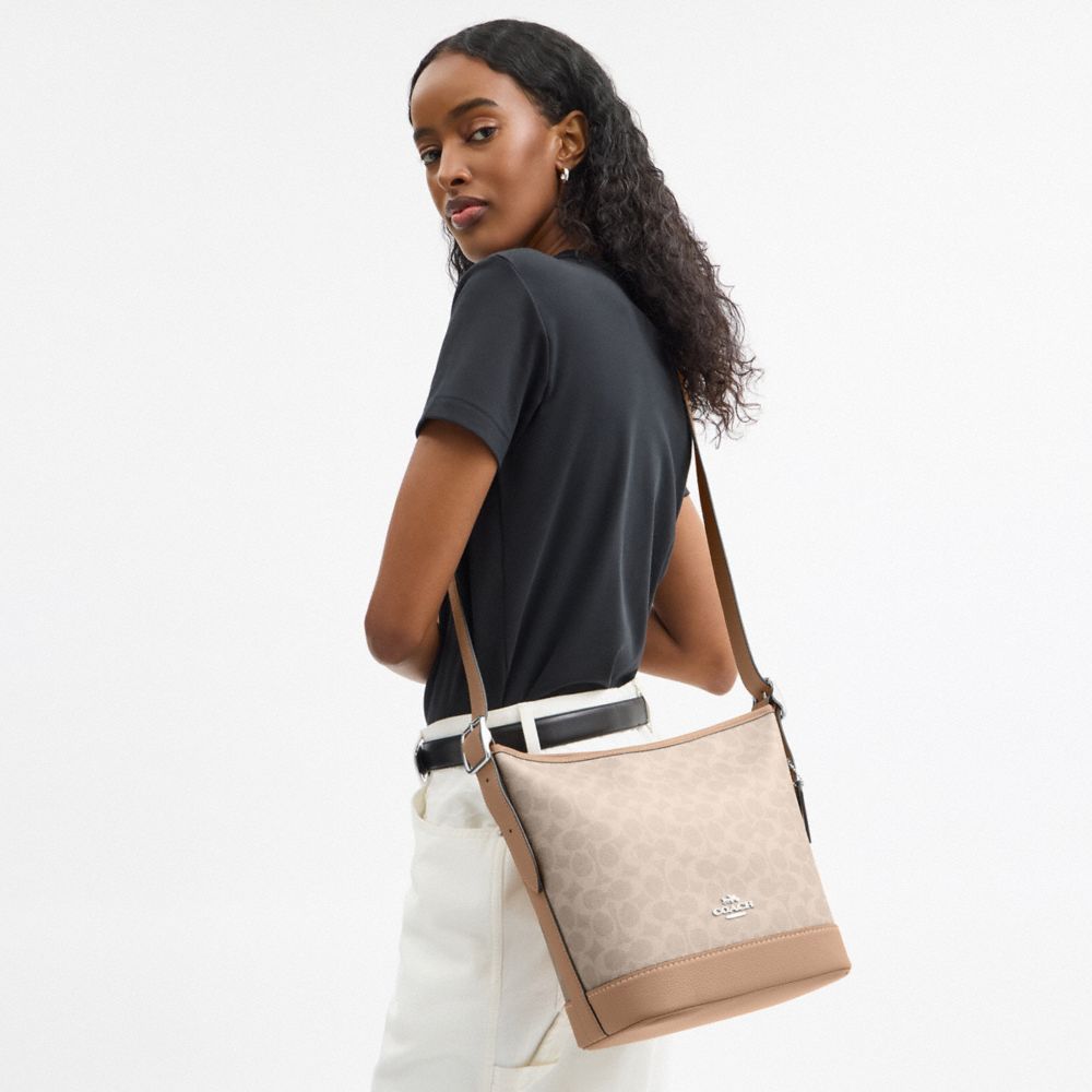 COACH®,Jude Duffle Bag In Signature Canvas,Beige