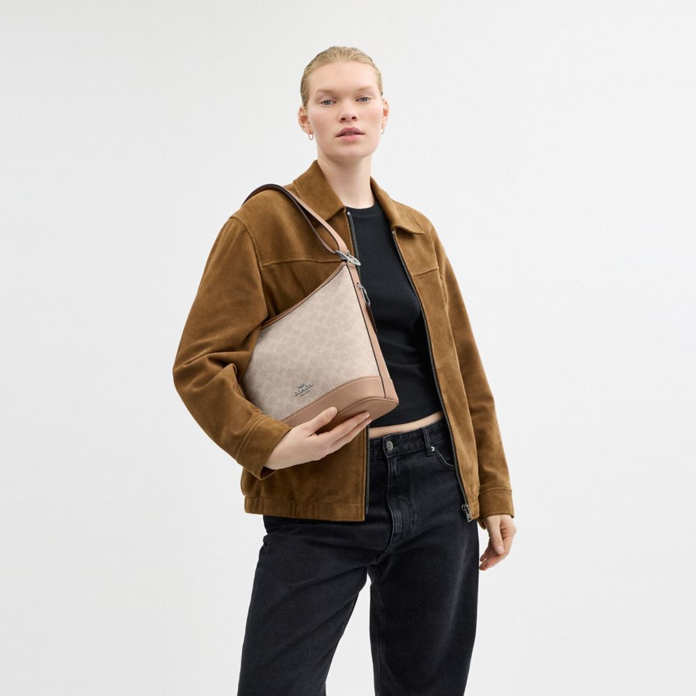 COACH®,Jude Duffle Bag In Signature Canvas,Beige,Detail View