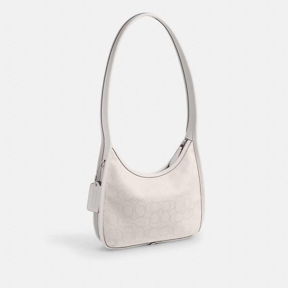 COACH®,Curve Zip Bag In Signature Jacquard,,Angle View