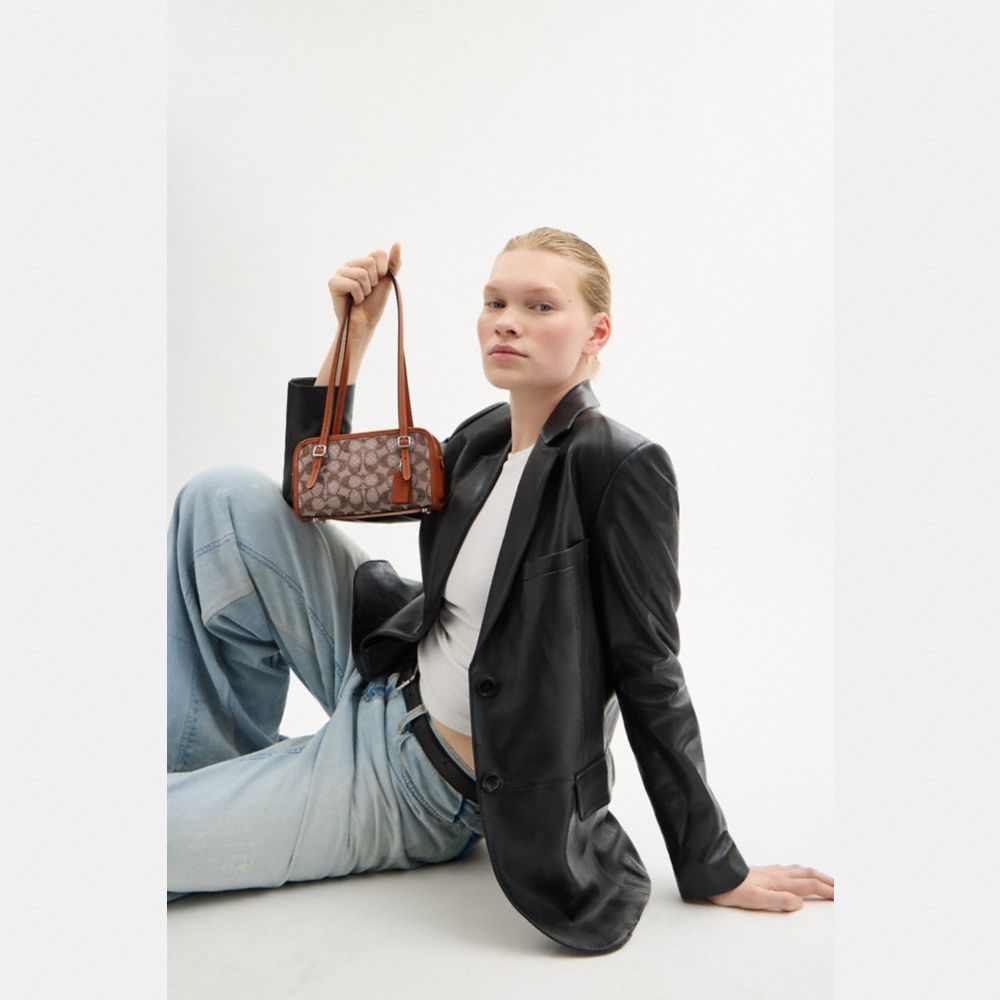Coach Swing Zip Bag 20 In Crystal Signature Jacquard