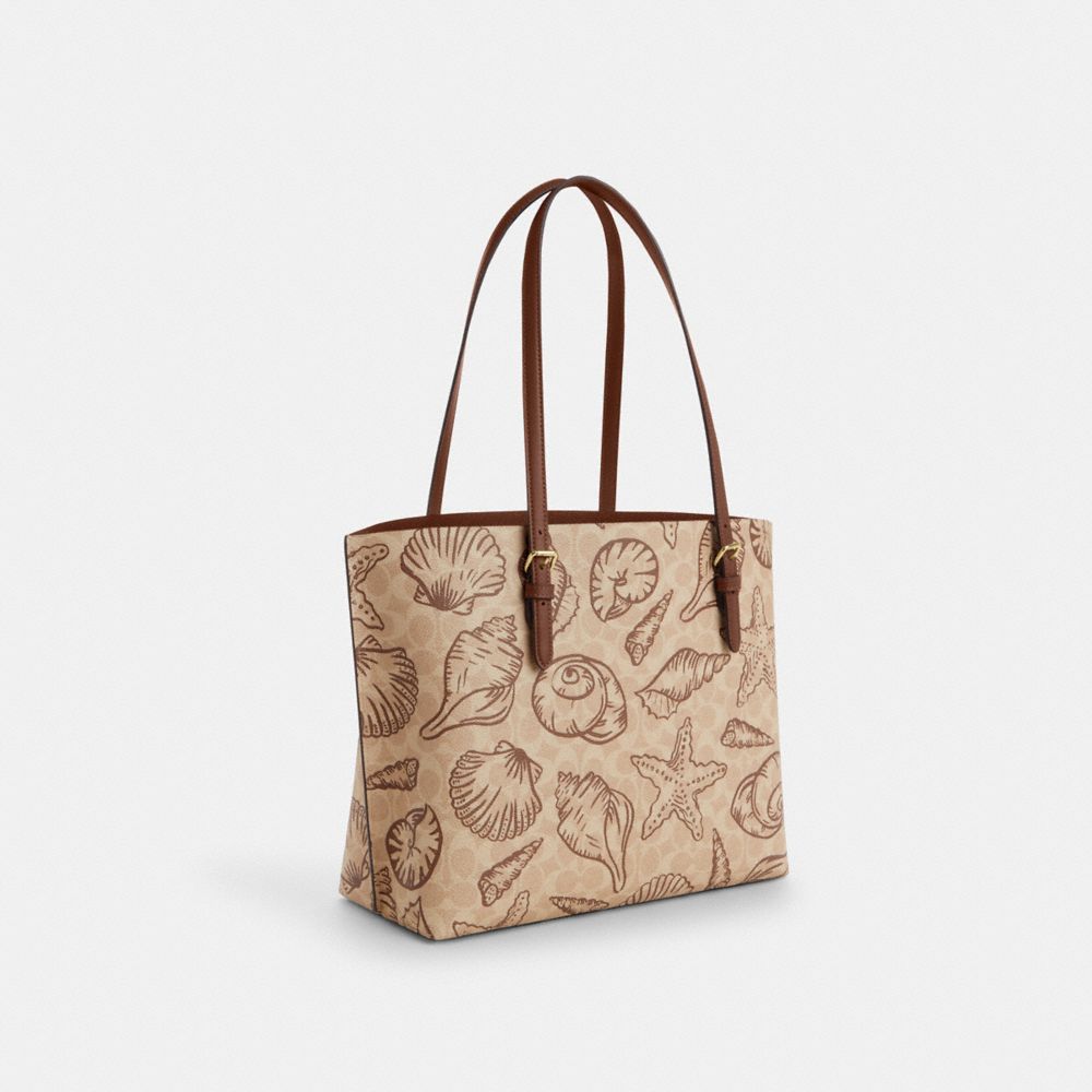 COACH®,Mollie Tote Bag In Signature Canvas With Shell Print,,Angle View
