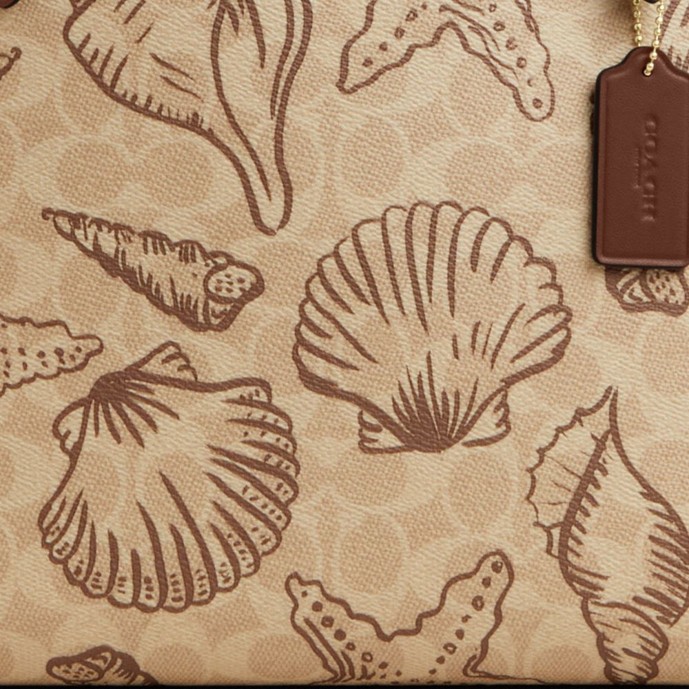 COACH®,Mollie Tote Bag In Signature Canvas With Shell Print,,Closer View
