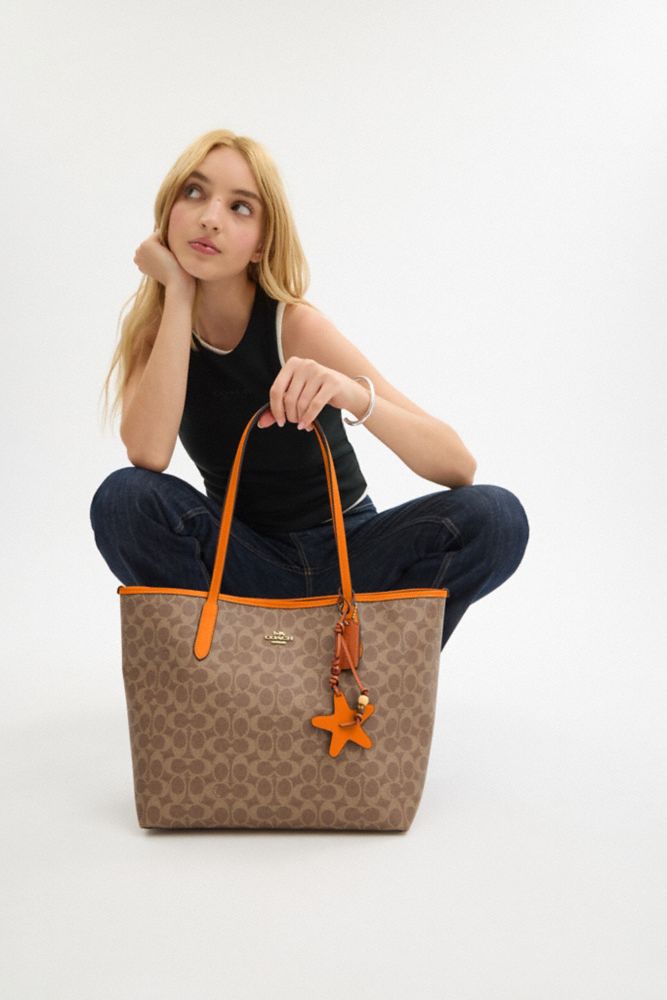 COACH®,City Tote Bag In Signature Canvas With Star Charm,
