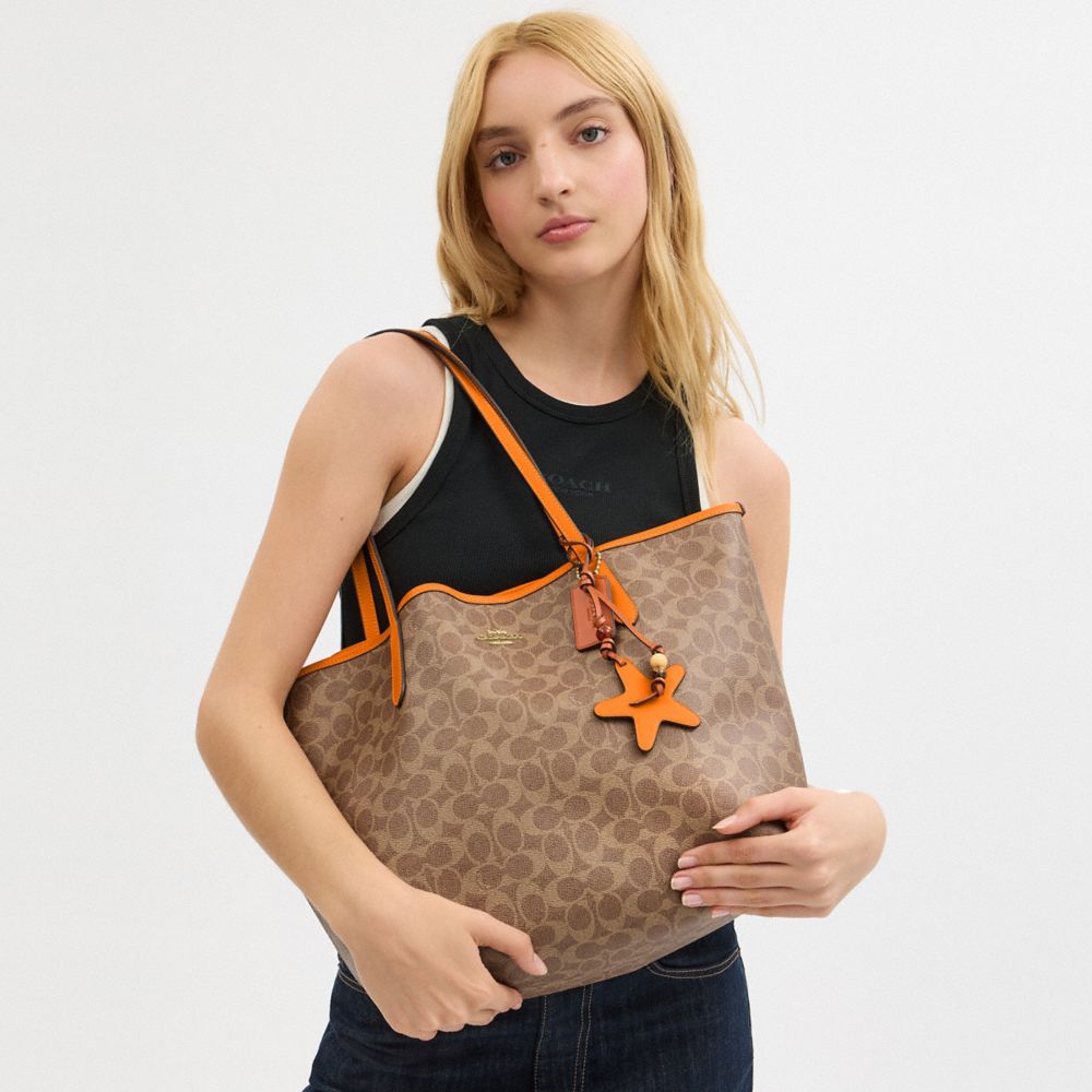 COACH®,City Tote Bag In Signature Canvas With Star Charm,,Detail View