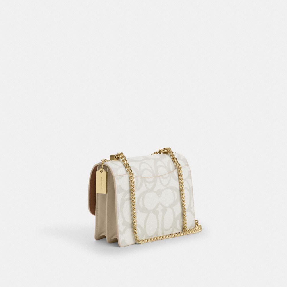 COACH®,Klare Crossbody Bag In Sketch Signature Canvas,,Angle View