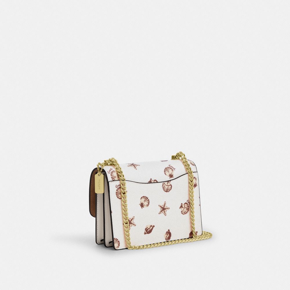 COACH®,Mini Klare Crossbody Bag With Shell Print,,Angle View