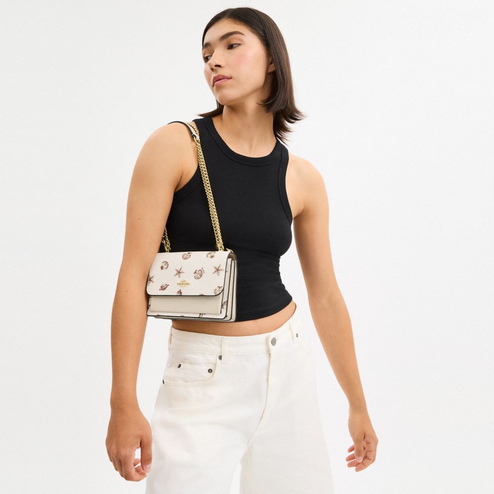 COACH®,Mini Klare Crossbody Bag With Shell Print,,Detail View