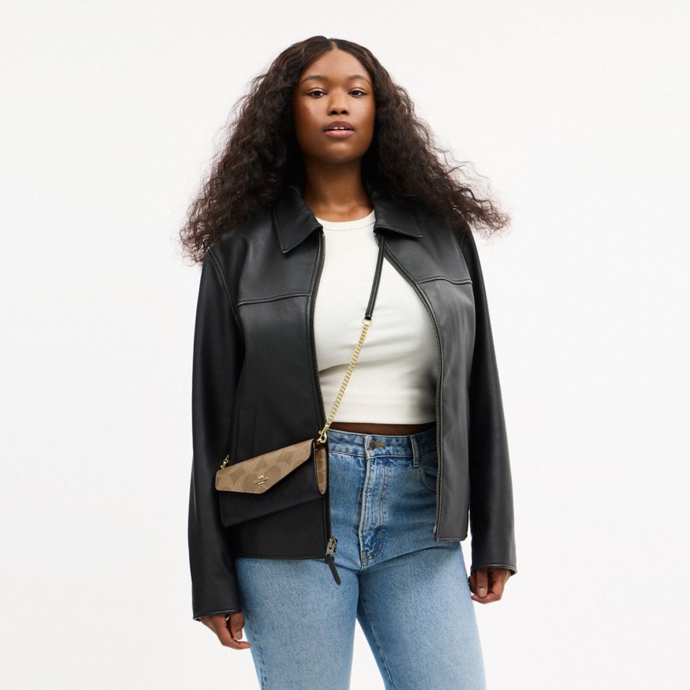 COACH®,Klare Wallet With Chain In Blocked Signature Canvas,