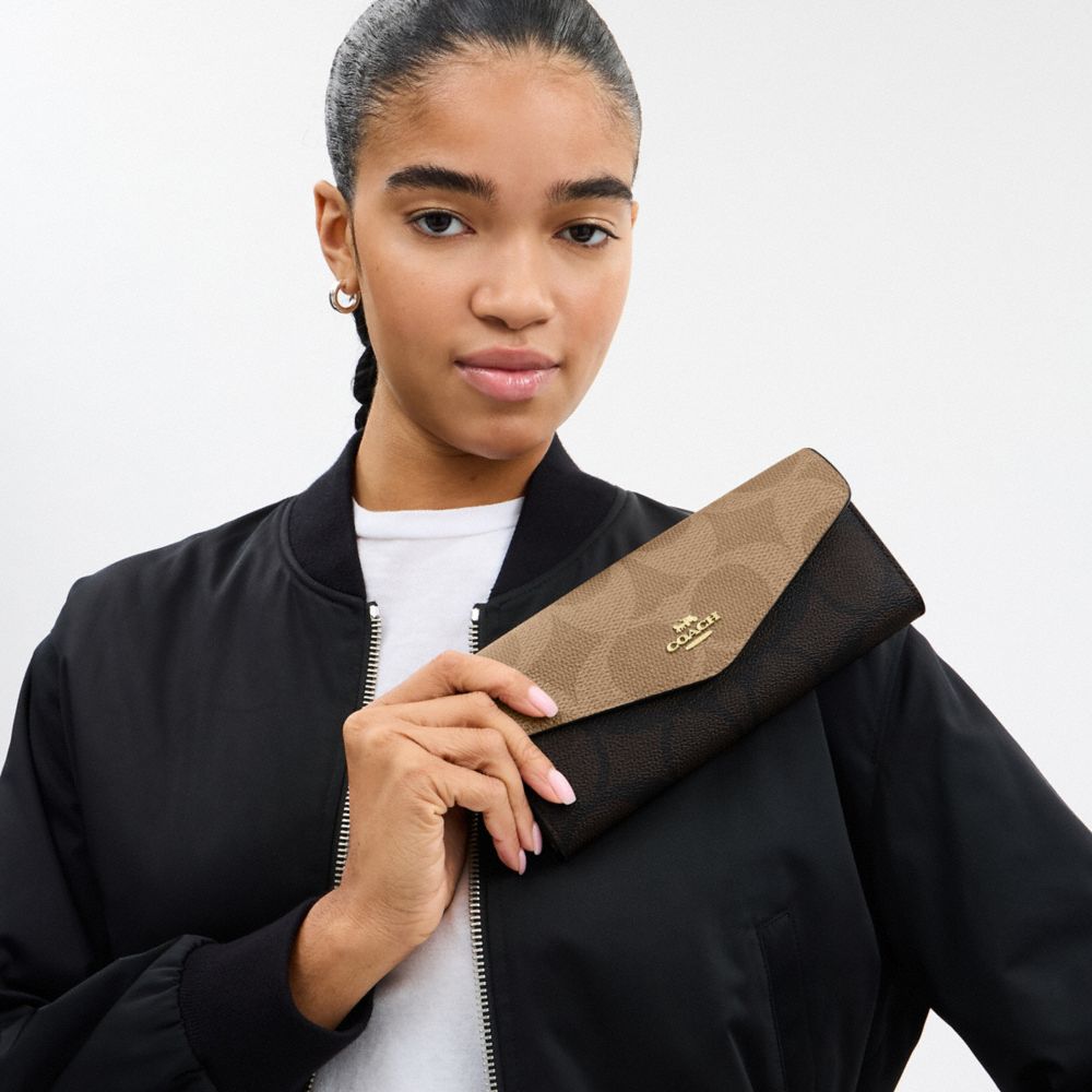 COACH®,Klare Wallet With Chain In Blocked Signature Canvas,,Detail View