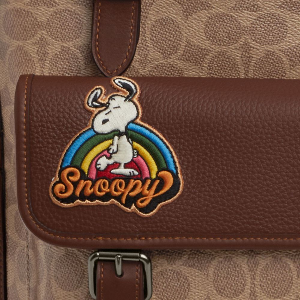 COACH®,Coach X Peanuts Sprint Backpack In Signature Canvas With Patches,,Closer View