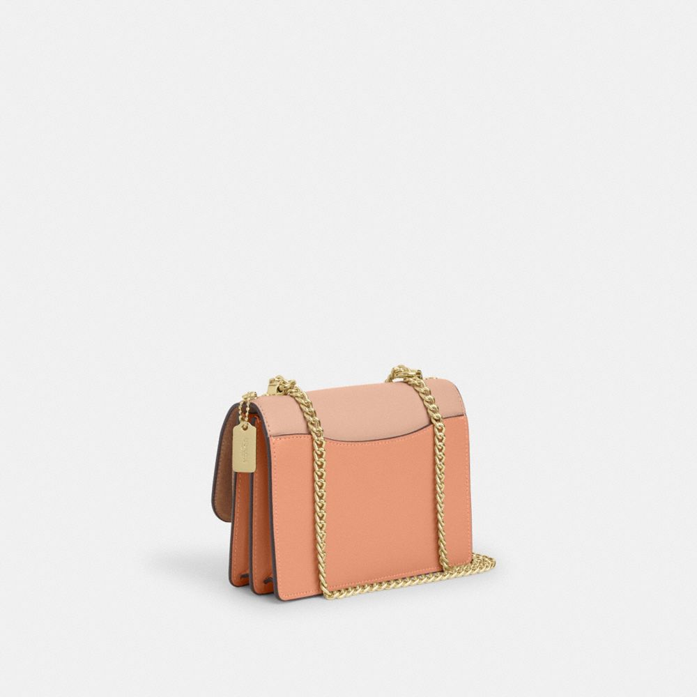 COACH®,Mini Klare Crossbody Bag In Colorblock Signature Canvas,,Angle View