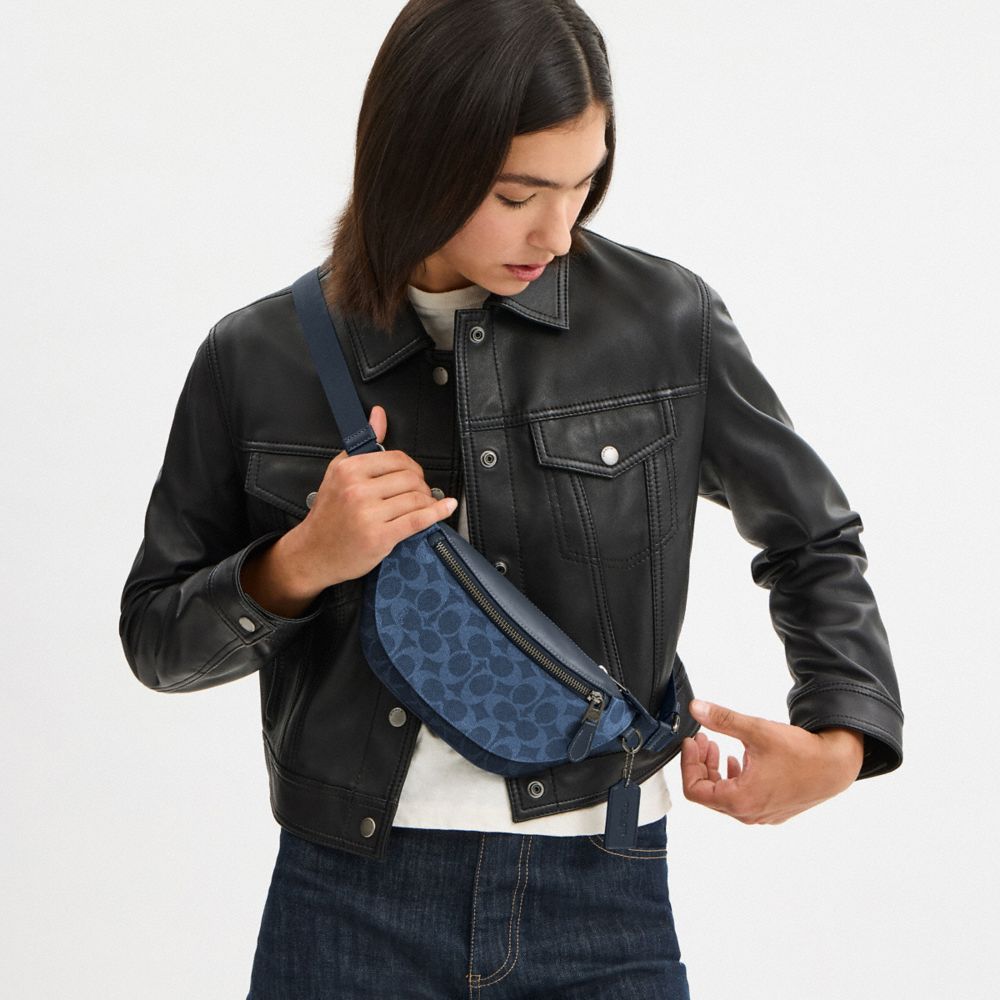 COACH®,Warren Mini Belt Bag In Blocked Signature Canvas,,Angle View