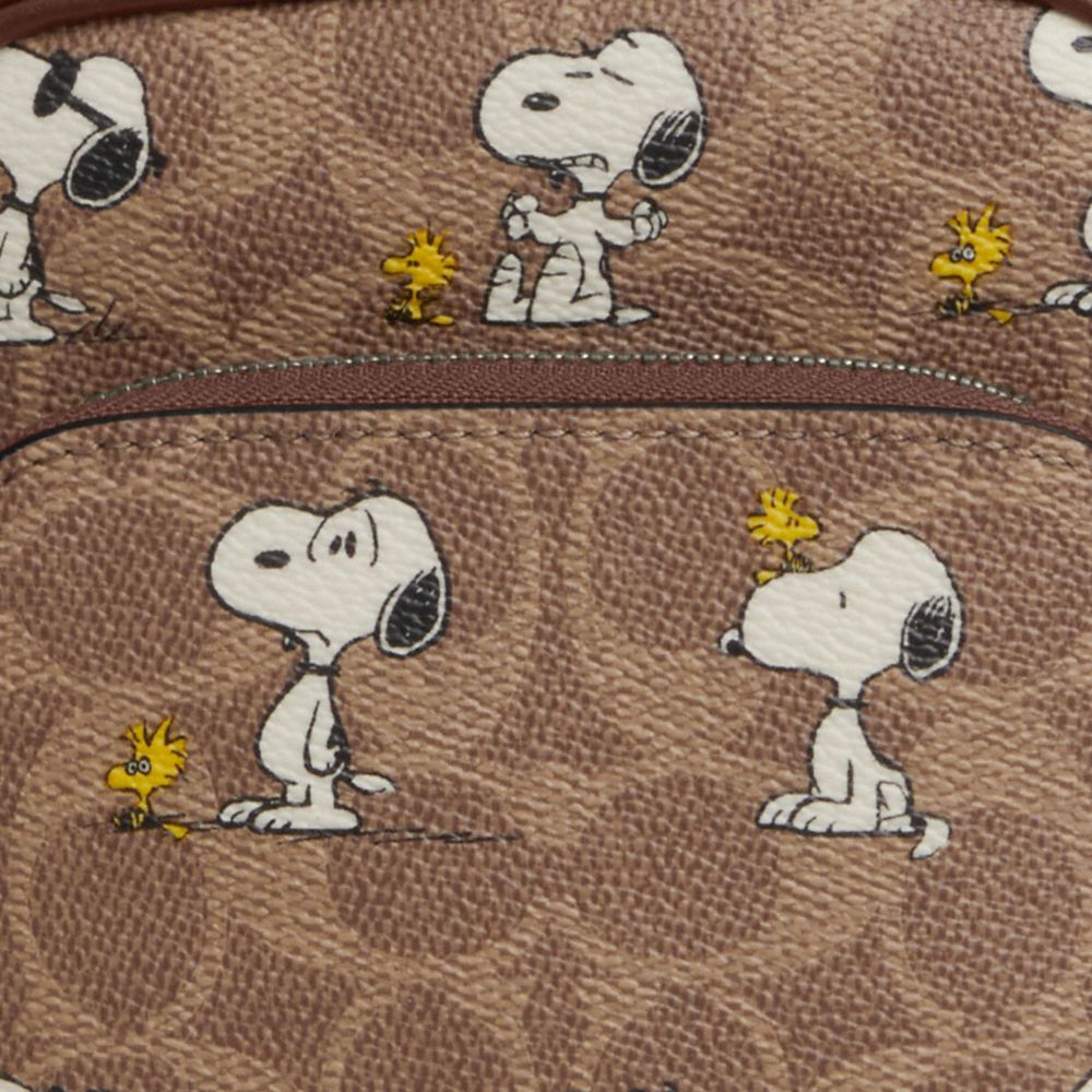COACH®,Coach X Peanuts Racer Sling Pack In Signature Canvas With Snoopy Print,,Closer View