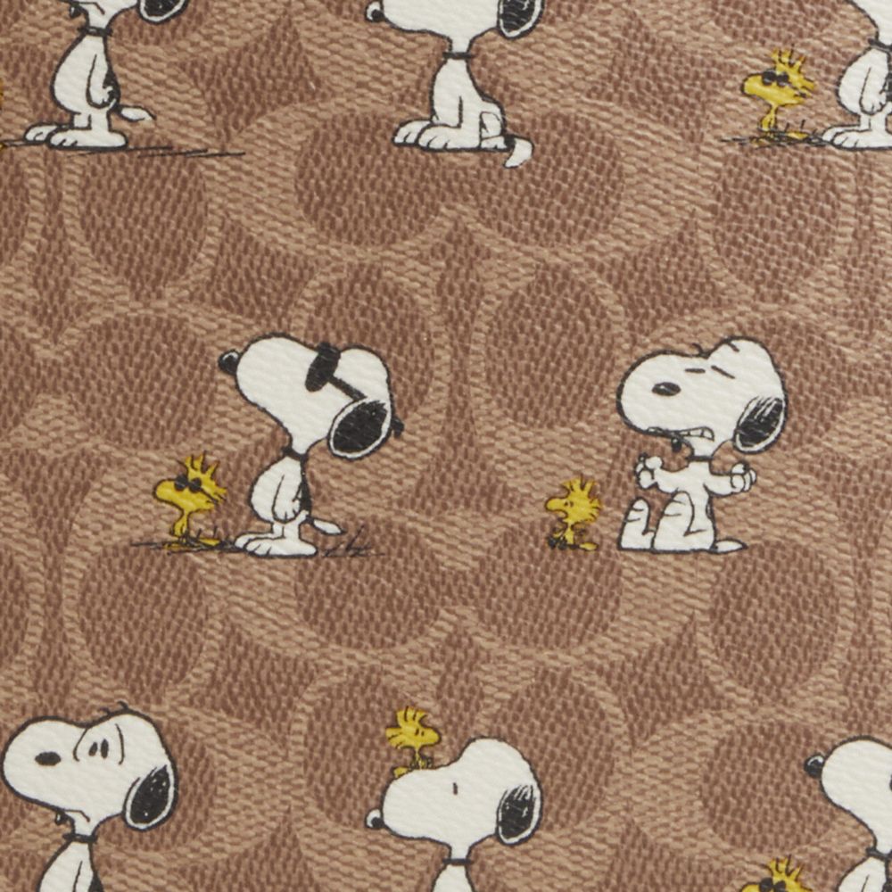 COACH®,Coach X Peanuts Sullivan Crossbody Bag In Signature Canvas With Snoopy Print,,Closer View