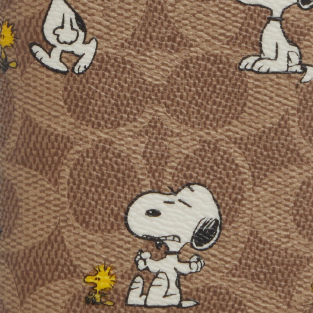 COACH®,Coach X Peanuts Id Card Wallet In Signature Canvas With Snoopy Print,,Closer View