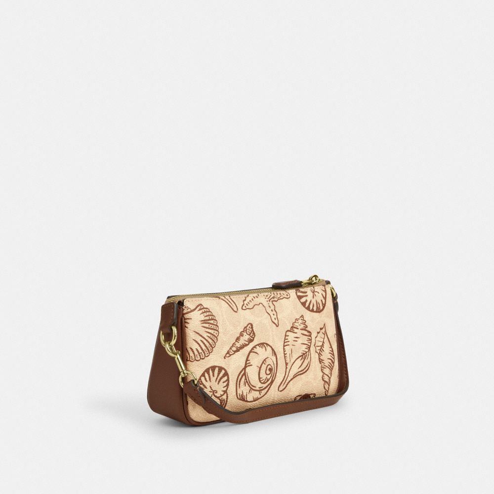 COACH®,Nolita 19 In Signature Canvas With Shell Print,,Angle View