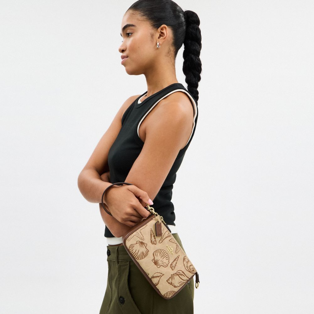 COACH®,Nolita 19 In Signature Canvas With Shell Print,,Detail View