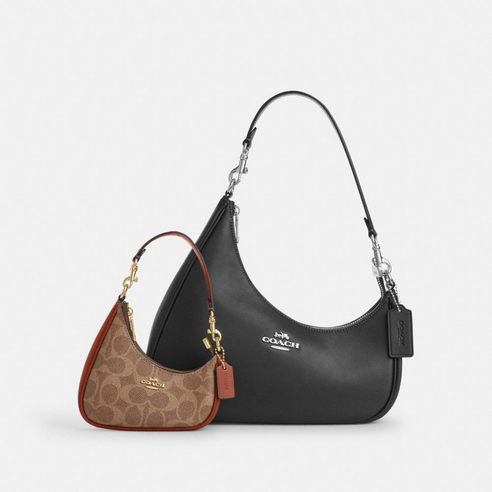COACH®,Mini Twisted Teri Bag Charm In Signature Canvas,,Angle View