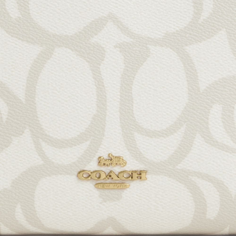 COACH®,Slim Crossbody Bag In Sketch Signature Canvas,,Closer View