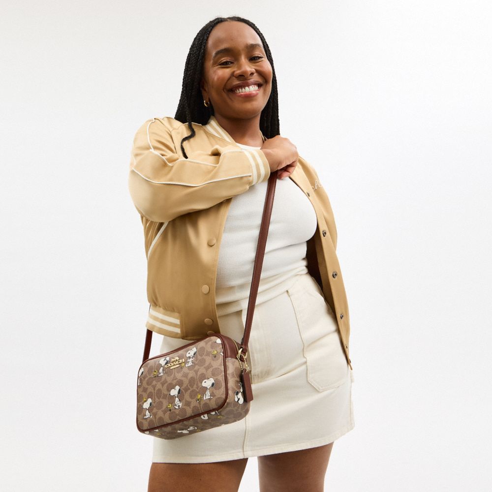 COACH®,Coach X Peanuts Jamie Camera Bag In Signature Canvas With Snoopy Print,