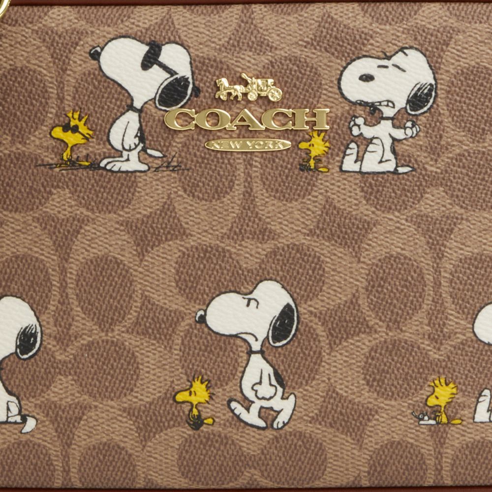 COACH®,Coach X Peanuts Jamie Camera Bag In Signature Canvas With Snoopy Print,,Closer View