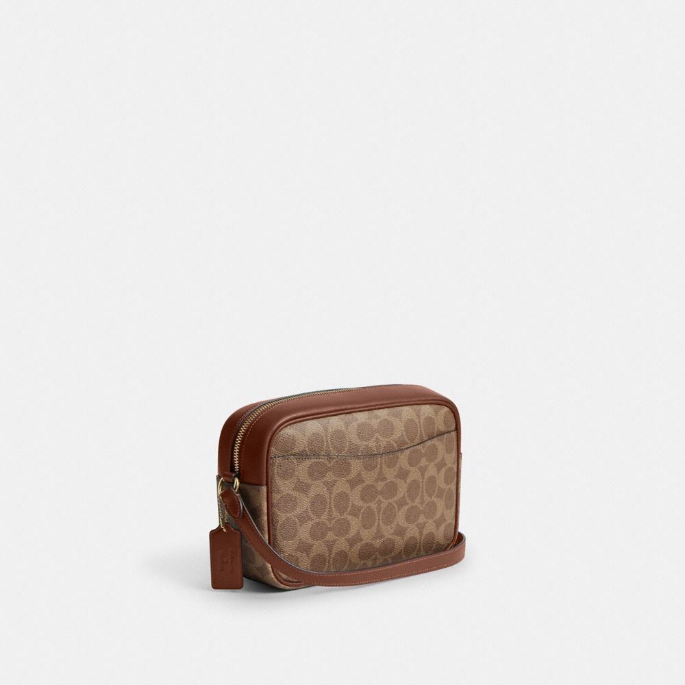 COACH®,Coach X Peanuts Jamie Camera Bag In Signature Canvas With Patches,,Angle View
