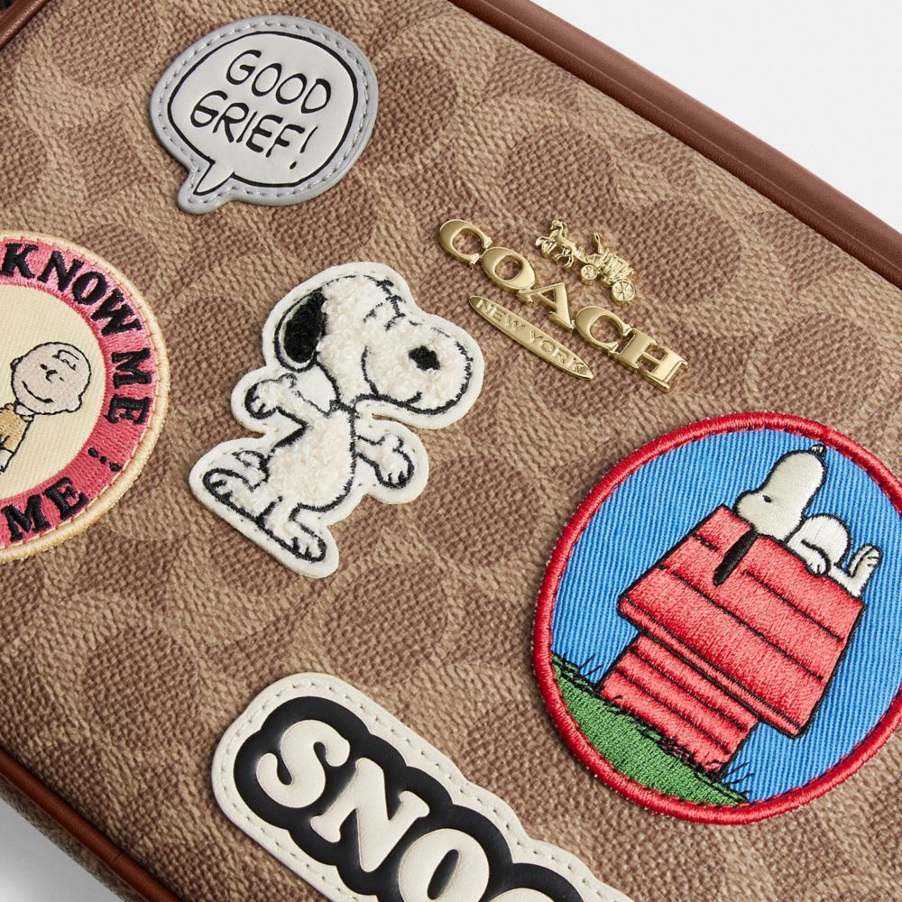 COACH®,Coach X Peanuts Jamie Camera Bag In Signature Canvas With Patches,,Closer View
