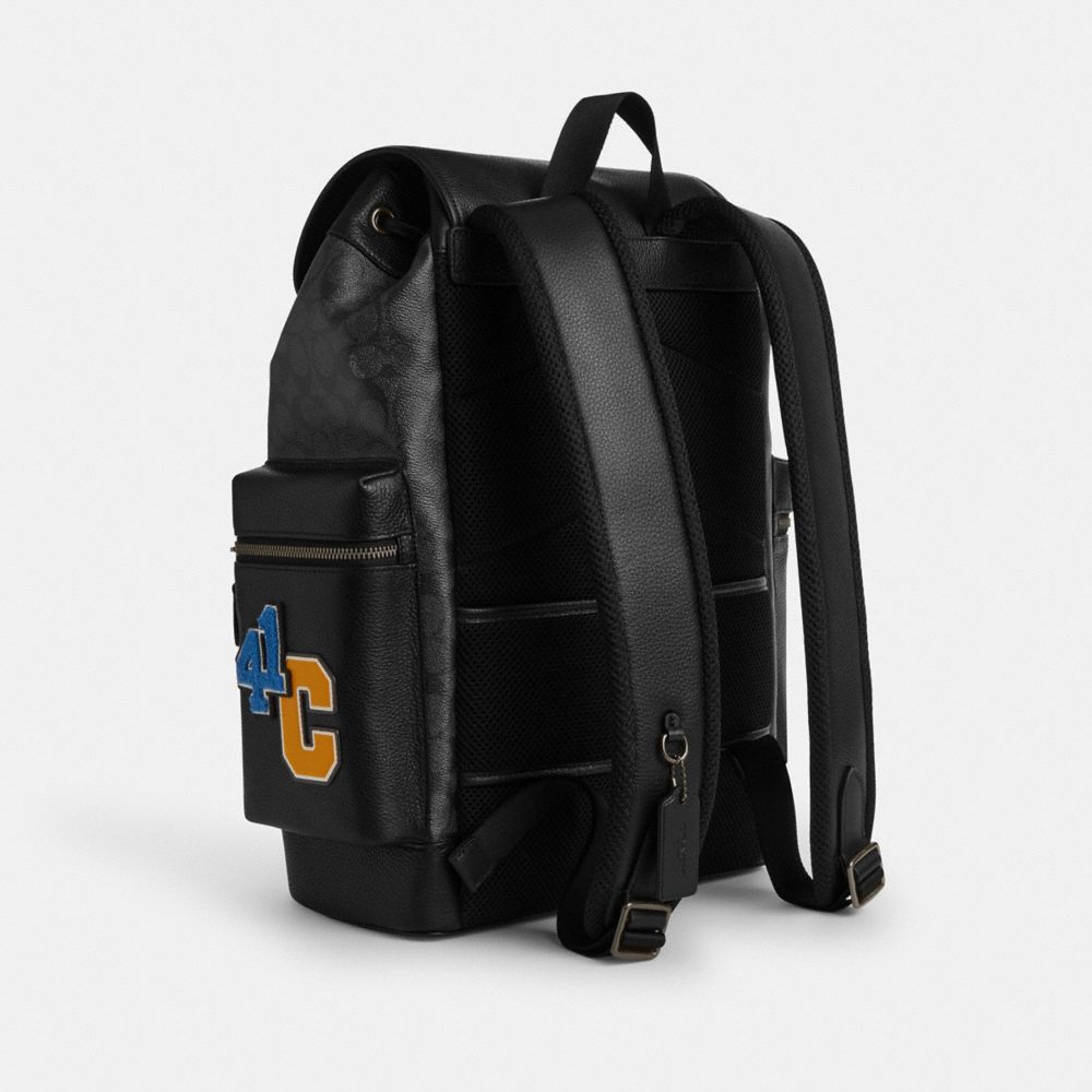 COACH®,Sprint Backpack In Signature Canvas With Patches,,Angle View