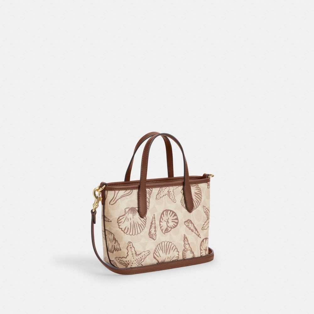 COACH®,City Mini Tote Bag In Signature Canvas With Shell Print,,Angle View