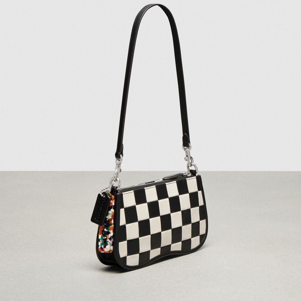 COACH®,Petit sac à bandoulière ondulé Alter/Ego en cuir recyclé à motif damier,Cuir Coachtopia,Noir/Craie,Angle View