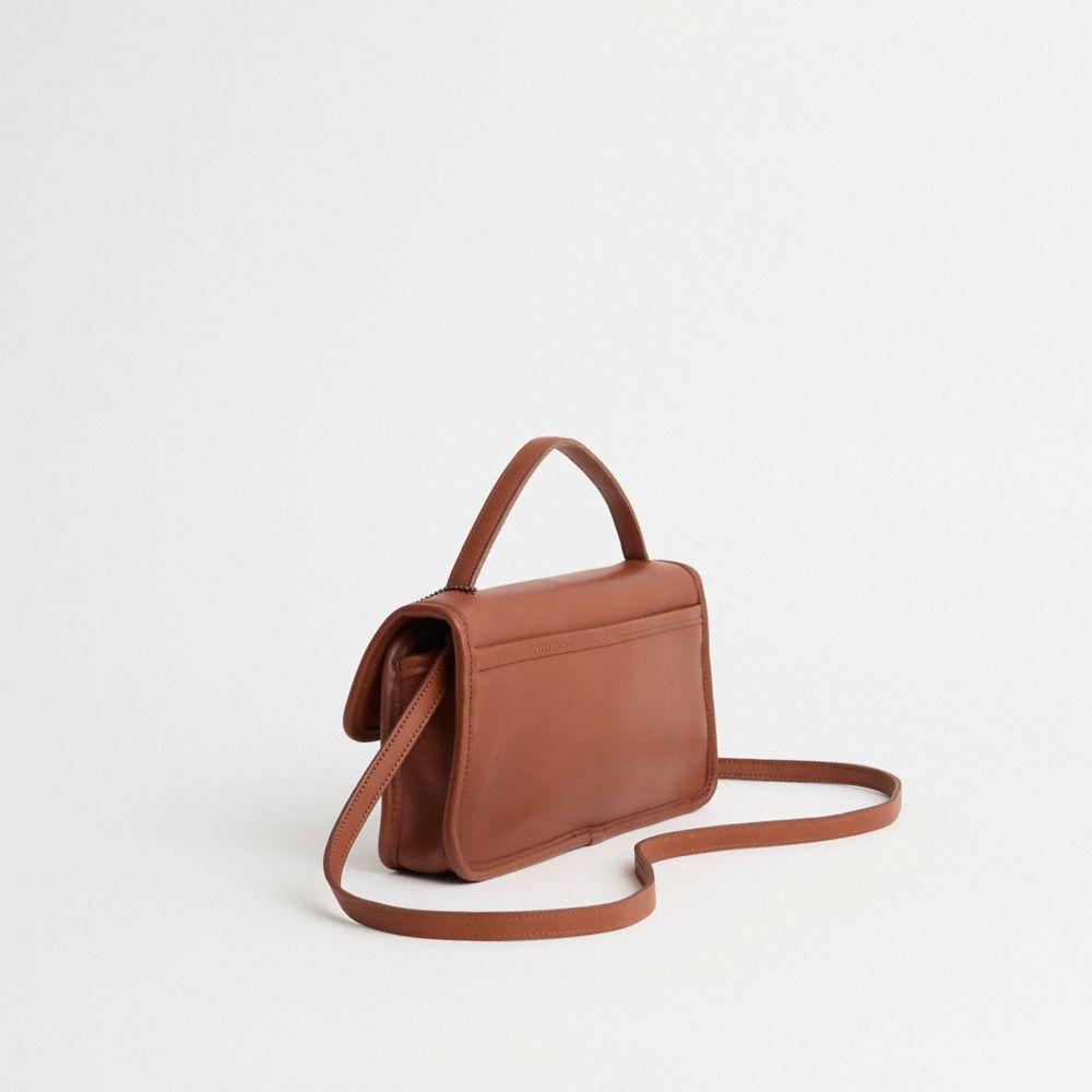 COACH®,Vintage Geometric Clutch,,Angle View