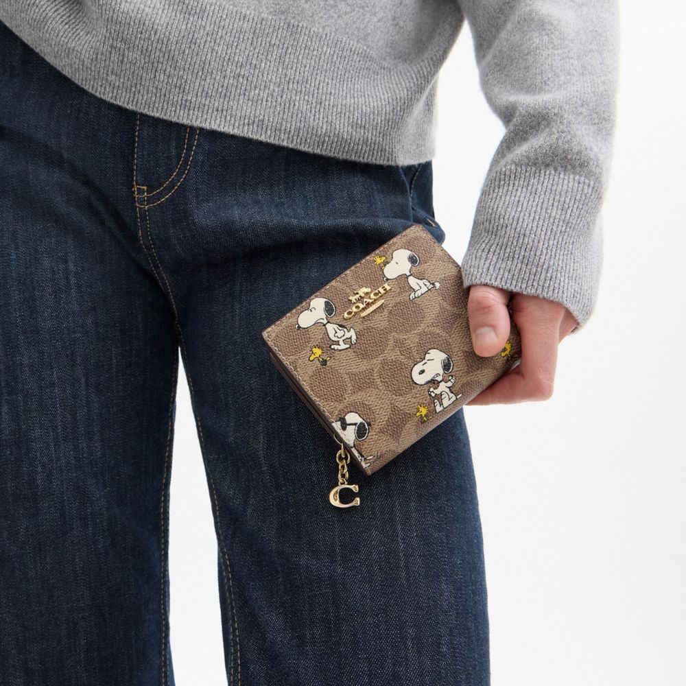 COACH®,Coach X Peanuts Snap Wallet In Signature Canvas With Snoopy Print,,Detail View