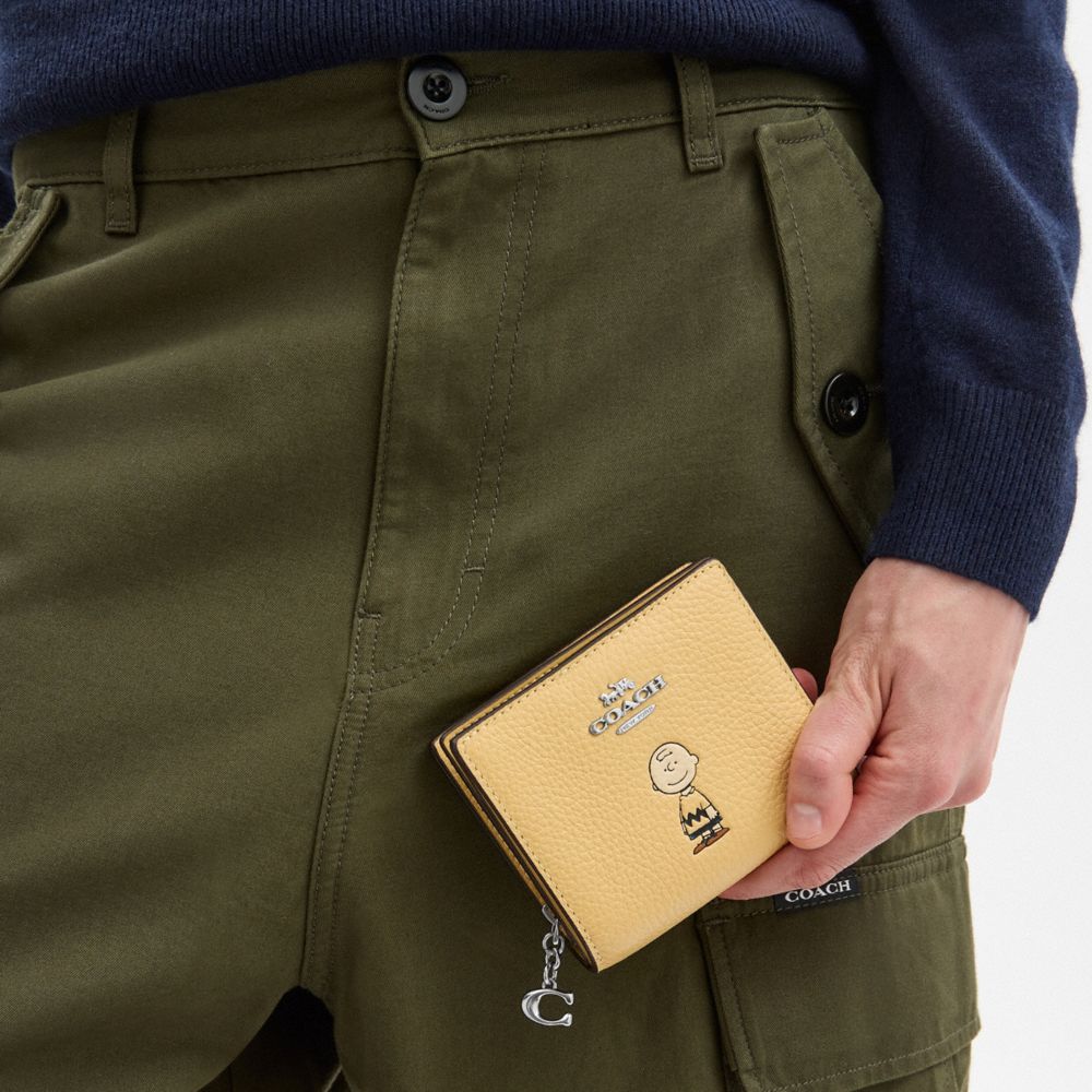 COACH®,Coach X Peanuts Snap Wallet With Charlie Brown,,Detail View