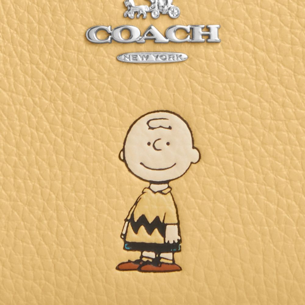 COACH®,Coach X Peanuts Snap Wallet With Charlie Brown,,Closer View