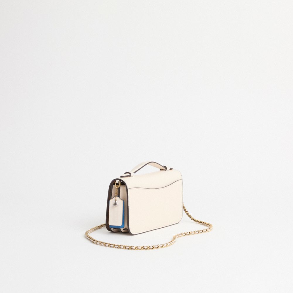 COACH®,Upcrafted Bea Crossbody Bag,Calfskin Leather,Crossbody,Applique,Shearling,3D Embellishment,Metal,Bow,Brass,Day Party,Cream,Angle View