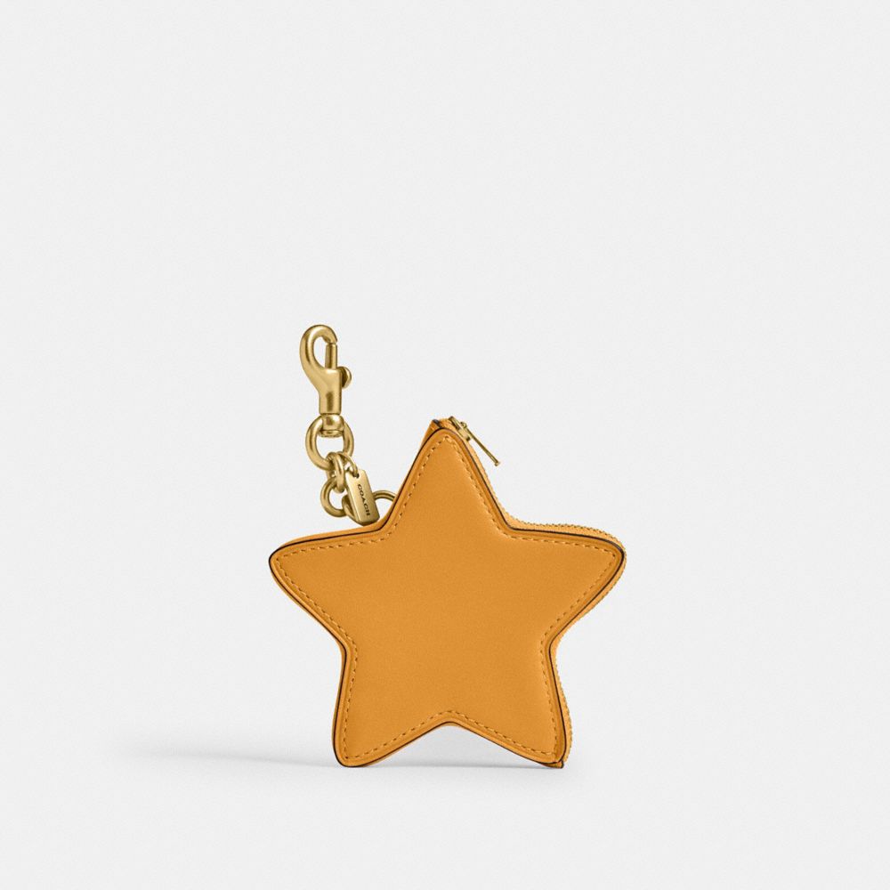 Shop Coach Star Coin Purse In Brass/yellow