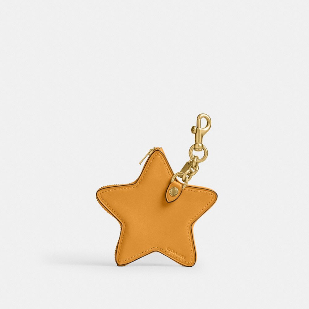 Shop Coach Star Coin Purse In Brass/yellow