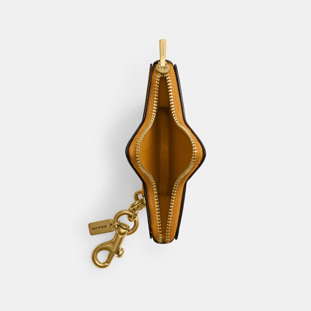 Shop Coach Star Coin Purse In Brass/yellow