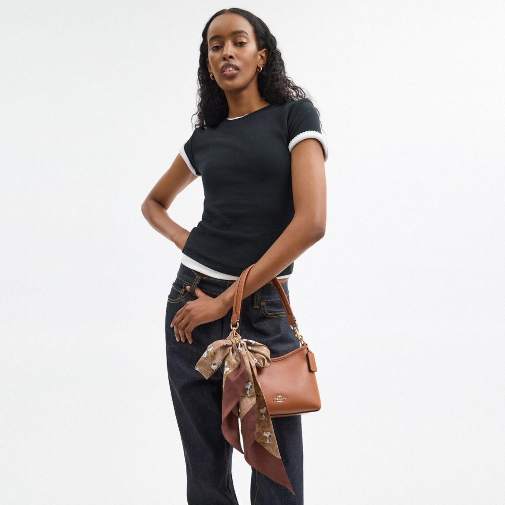 COACH®,【COACH X PEANUTS】シグネチャー スヌーピー プリント シルク スキニー スカーフ,ファッション雑貨,ﾀﾝ/ﾁｮｰｸ