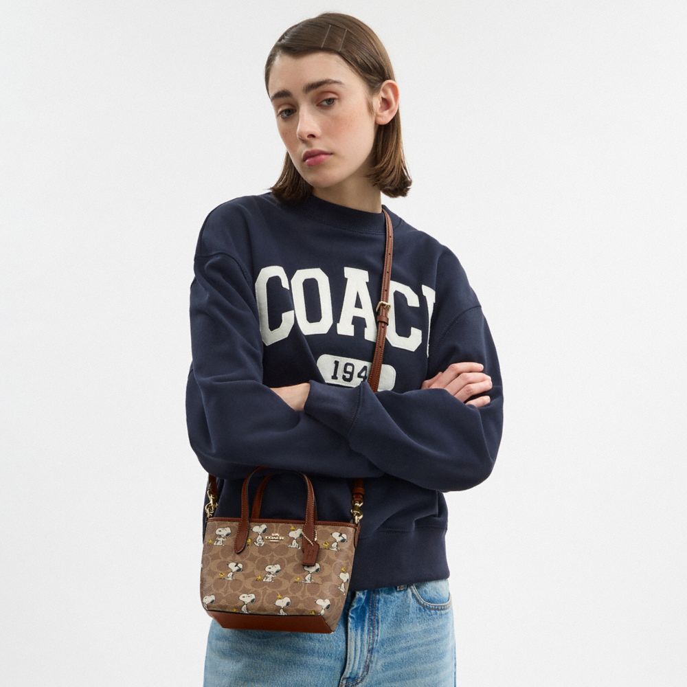 COACH®,Coach X Peanuts City Mini Tote Bag In Signature Canvas With Snoopy Print,